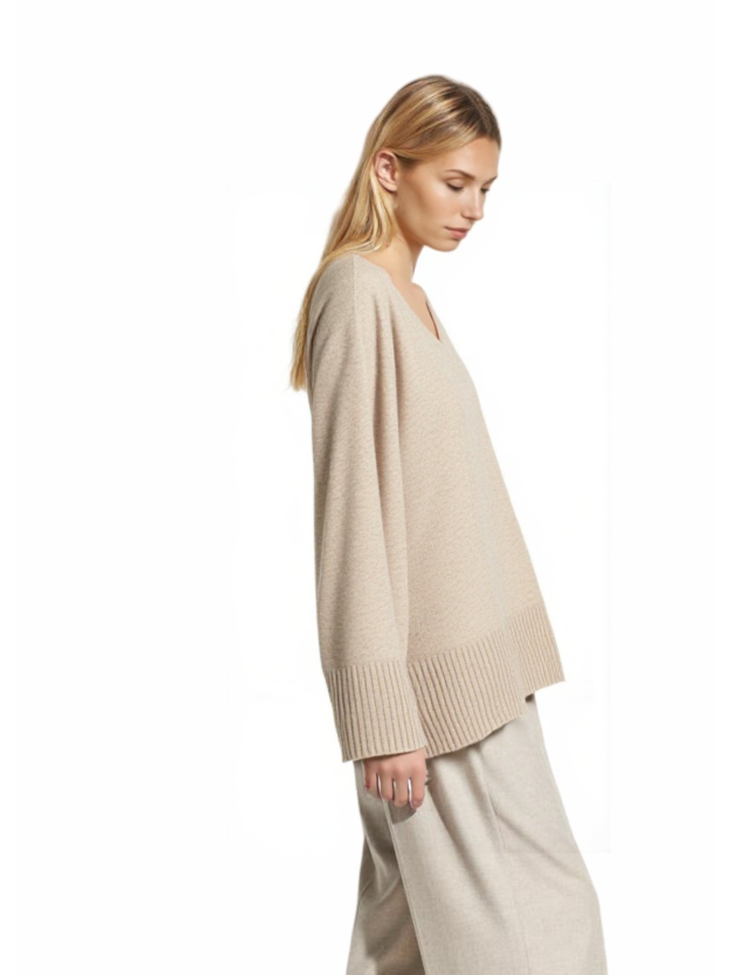 beige v-neck oversized sweater women, premium merino wool sweater, all-seasonal comfort wear, hypoallergenic office sweater, relaxed fit v-neck design, eco-friendly luxury knitting, versatile casual formal outfit, free shipping merino wool sweater, trendy beige knitwear, winter spring transitional sweater